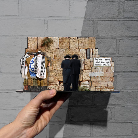 THIS IS JERUSALEM Israel Souvenir — Western Wall Miniature set held by a hand, depicting people at the Western Wall.