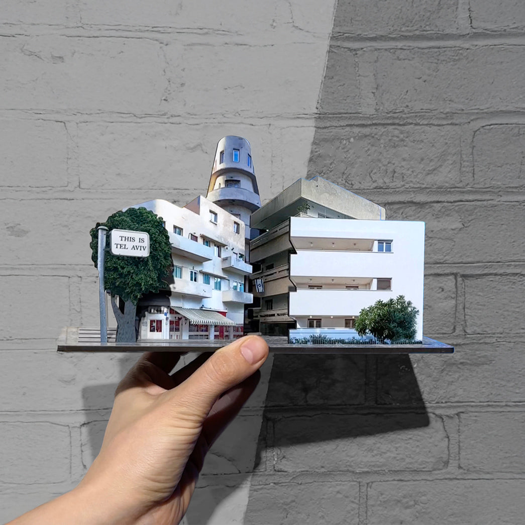THIS IS TEL AVIV Israel Souvenir — Bauhaus Miniature displayed in hand showcasing iconic architecture.