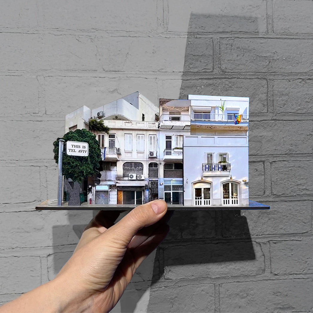 THIS IS TEL AVIV Israel Souvenir — City Miniature held in hand, showcasing Tel Aviv's iconic white buildings and charm.