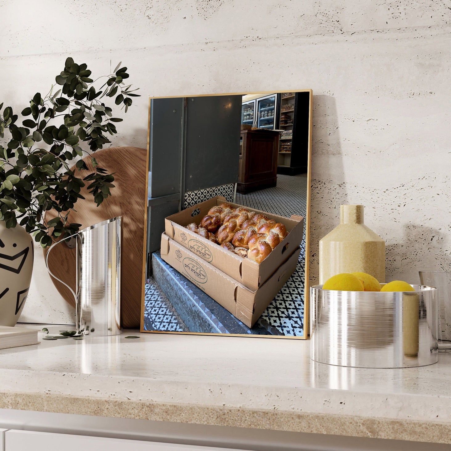 Printed Poster of Challah loaves in boxes on a kitchen counter with decorative elements.
