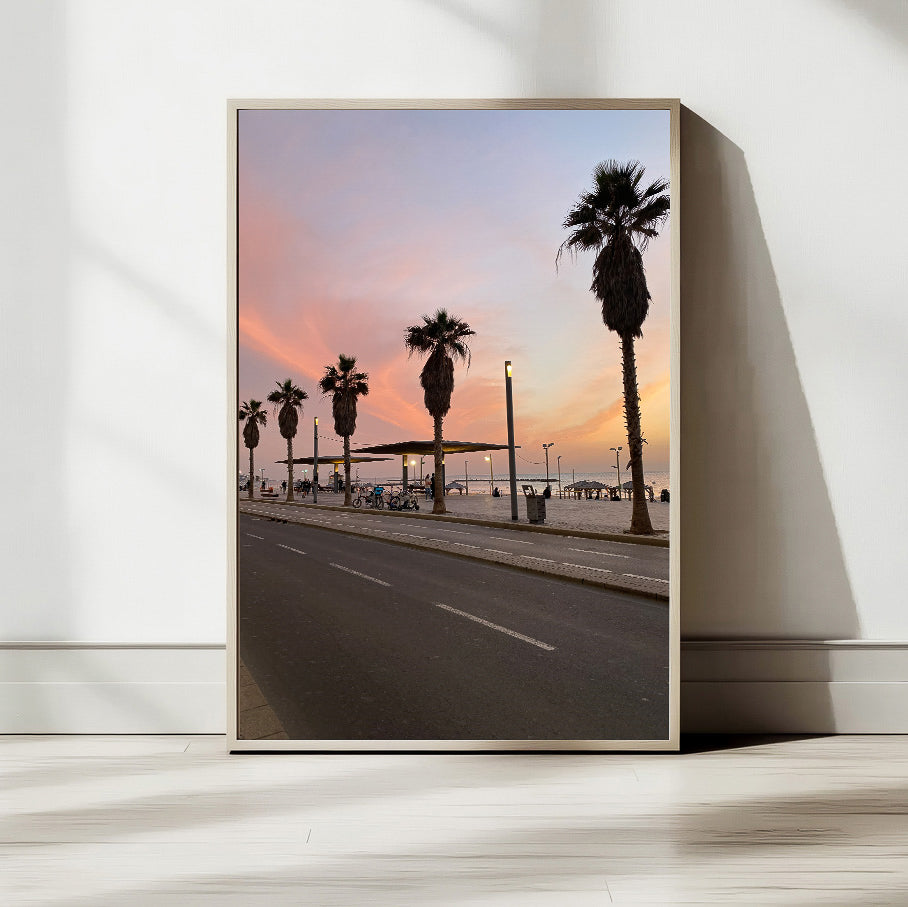Sunset Sky of Tel Aviv photography print showcasing palm trees and a colorful sunset on the Tel Aviv seaside.