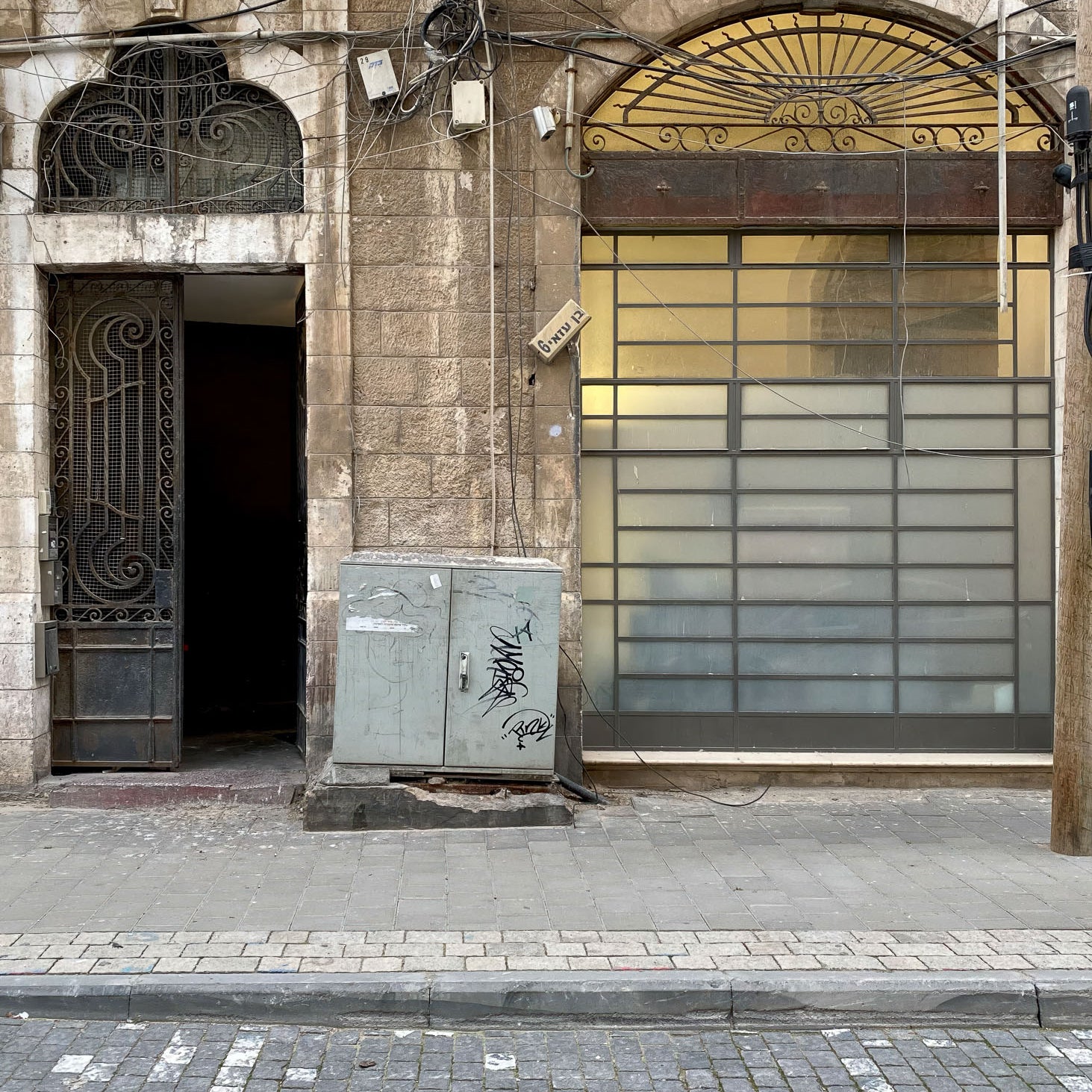 Jaffa Architecture — Tel Aviv photography print of a street view with vintage building facade and modern elements.