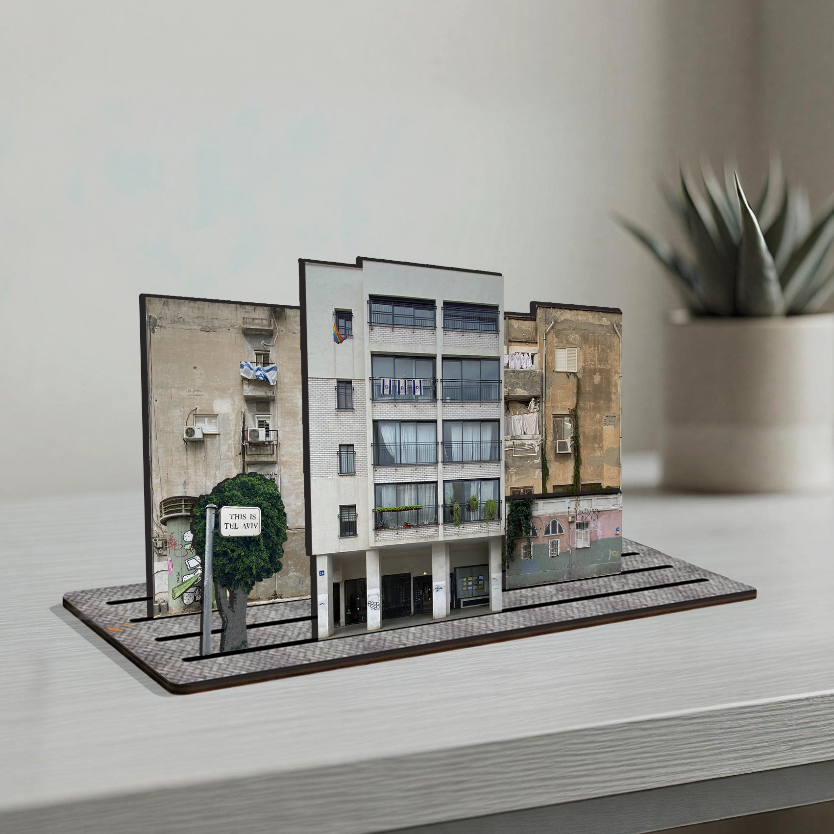 THIS IS TEL AVIV — Wooden Miniature of a charming building in the city center, showcasing Tel Aviv's architectural style.