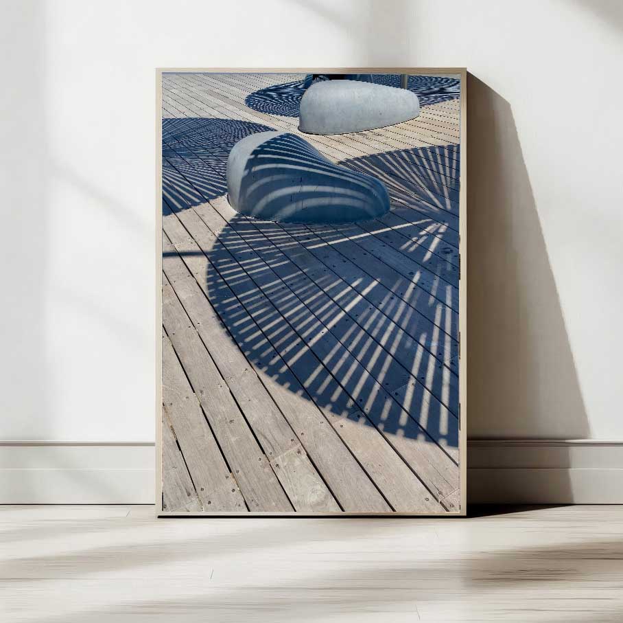 Printed poster showcasing shadows in Tel Aviv, highlighting unique designs and textures.