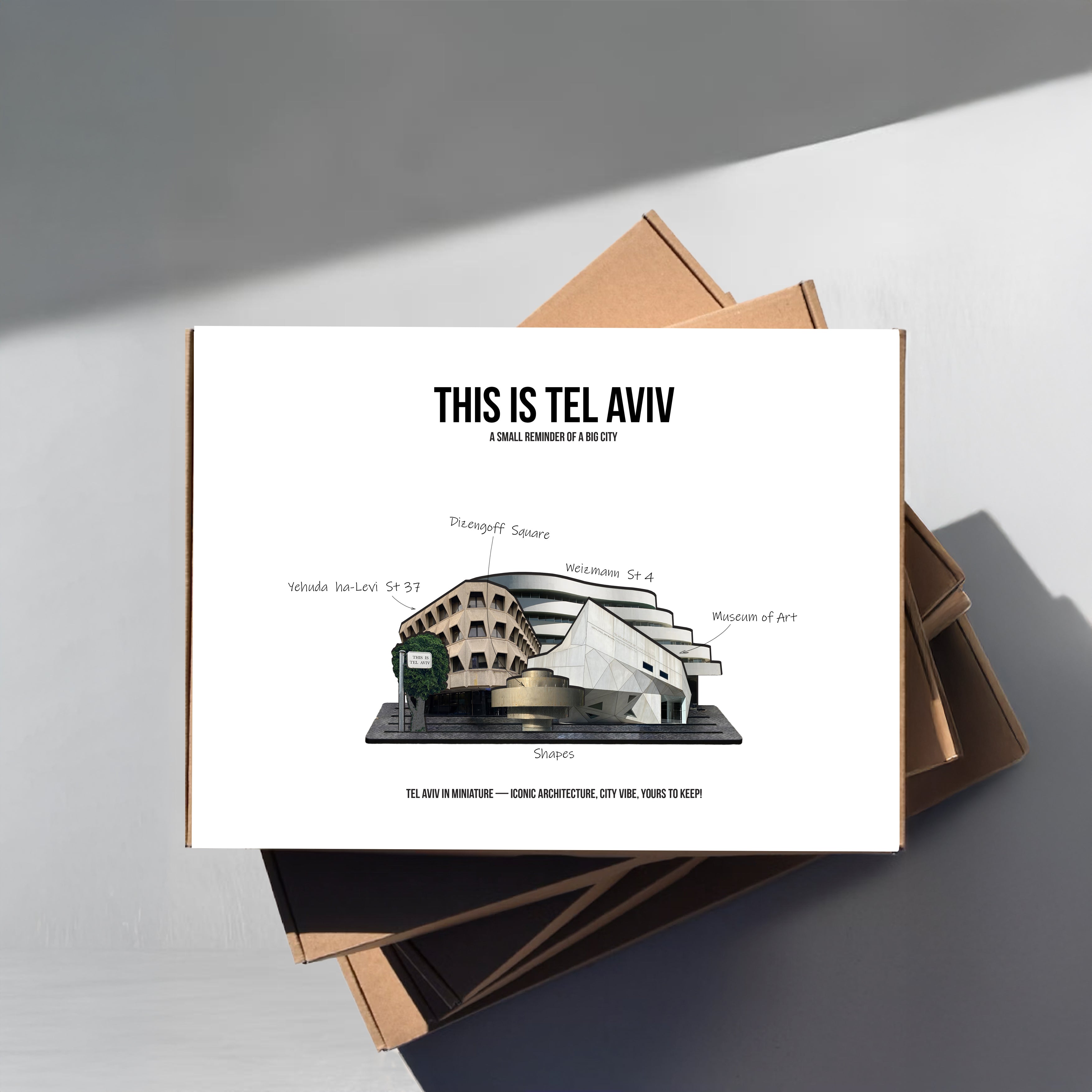 THIS IS TEL AVIV — Wooden Miniature set displayed with architectural details of Tel Aviv's urban landscape.